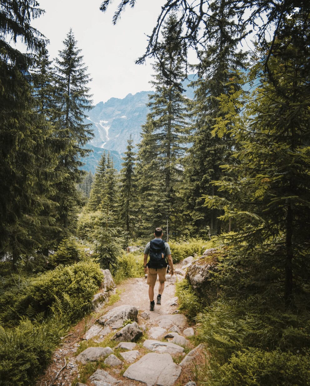 man walking solo on rock path She has a name