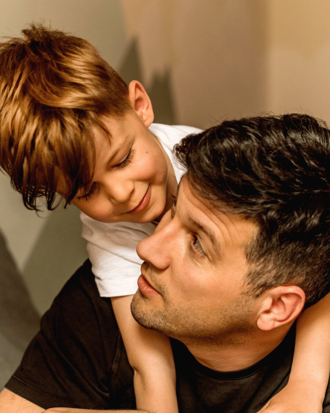 father and son playing together