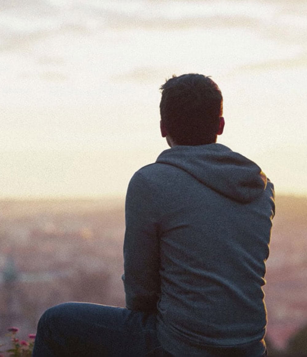 Man looking over city